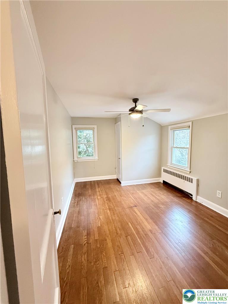 2109 Kemmerer Street Bethlehem, PA 18017 - Photo 23 of 41 an empty room with wooden floor and windows