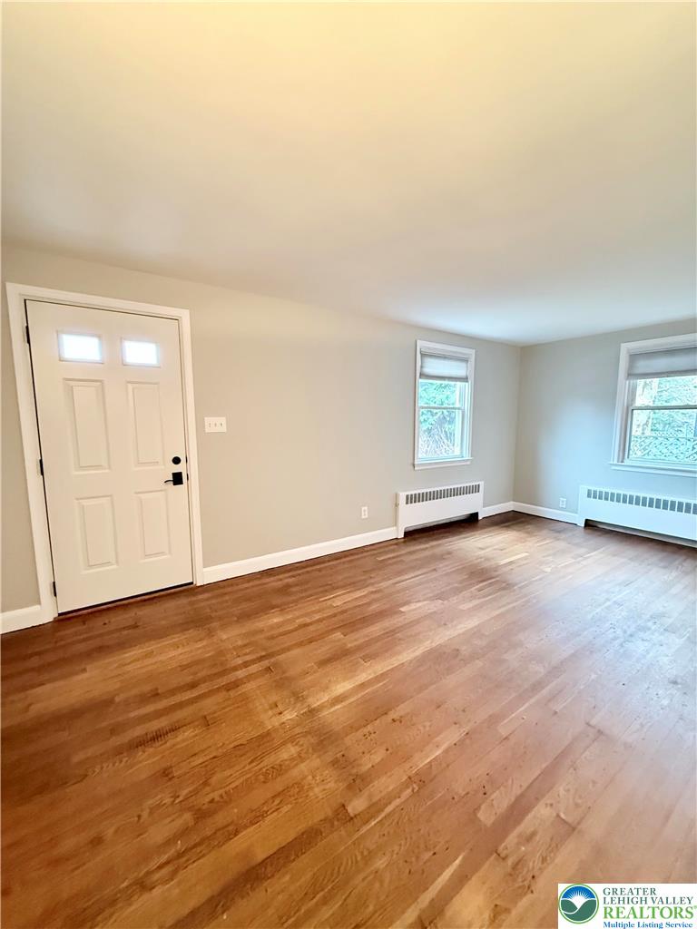 2109 Kemmerer Street Bethlehem, PA 18017 - Photo 3 of 41 an empty room with wooden floor and windows