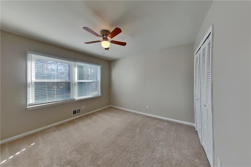 1916 Beckett Drive Marietta, GA 30062 - Photo 14 of 20 a view of an empty room with a window
