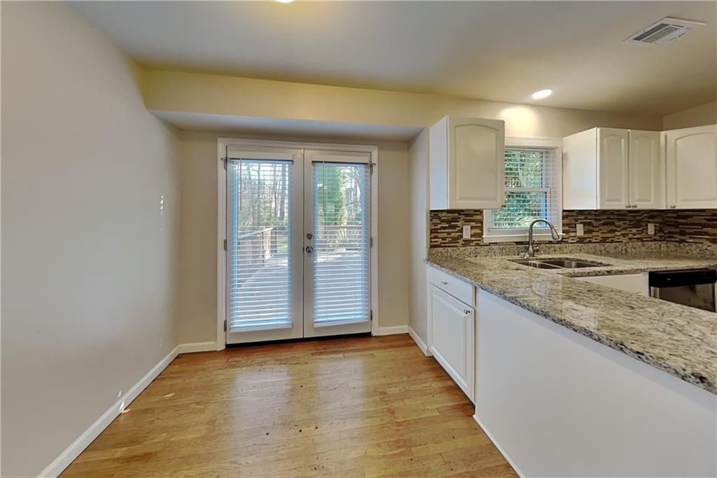 1916 Beckett Drive Marietta, GA 30062 - Photo 5 of 20 a view of a kitchen with granite countertop cabinets