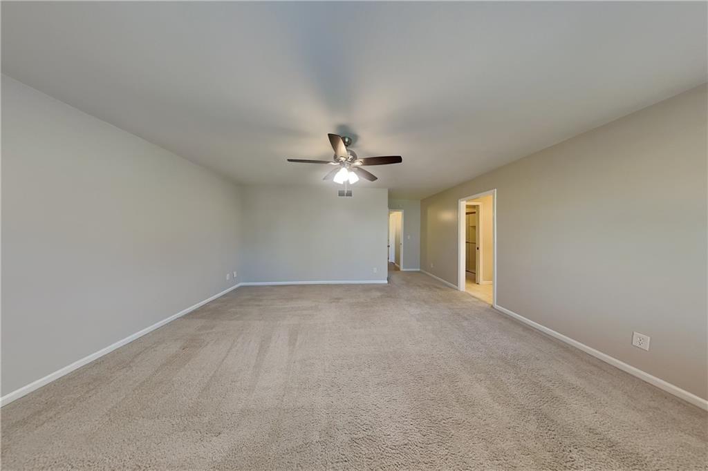 1916 Beckett Drive Marietta, GA 30062 - Photo 8 of 20 wooden floor in an empty room