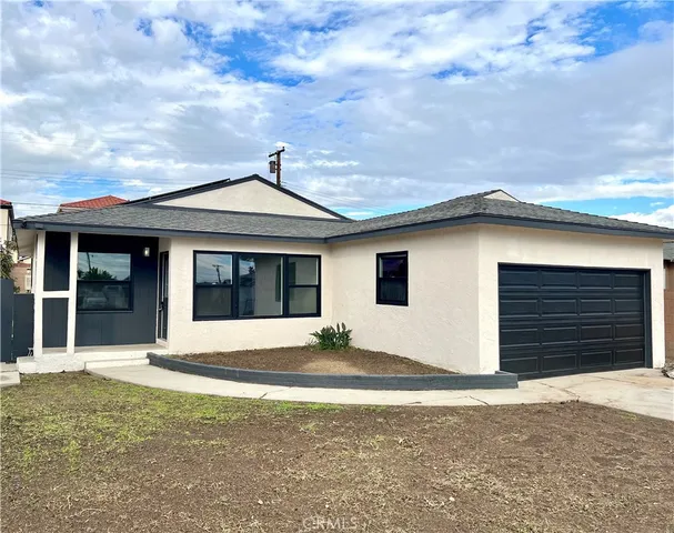 a house with yard in front of it
