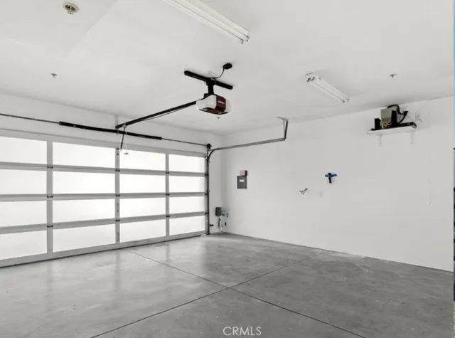 a view of hallway with wooden floor