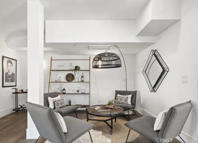a bathroom with a double vanity sink toilet and shower