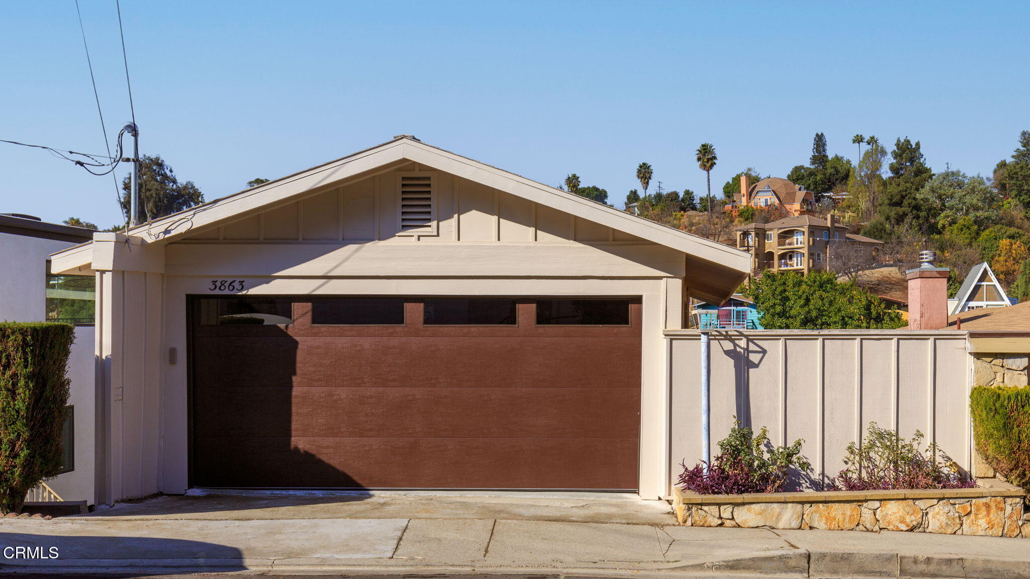 3863 Latrobe Street Los Angeles, CA 90031 - Photo 1 of 2 a front view of a house with a garage