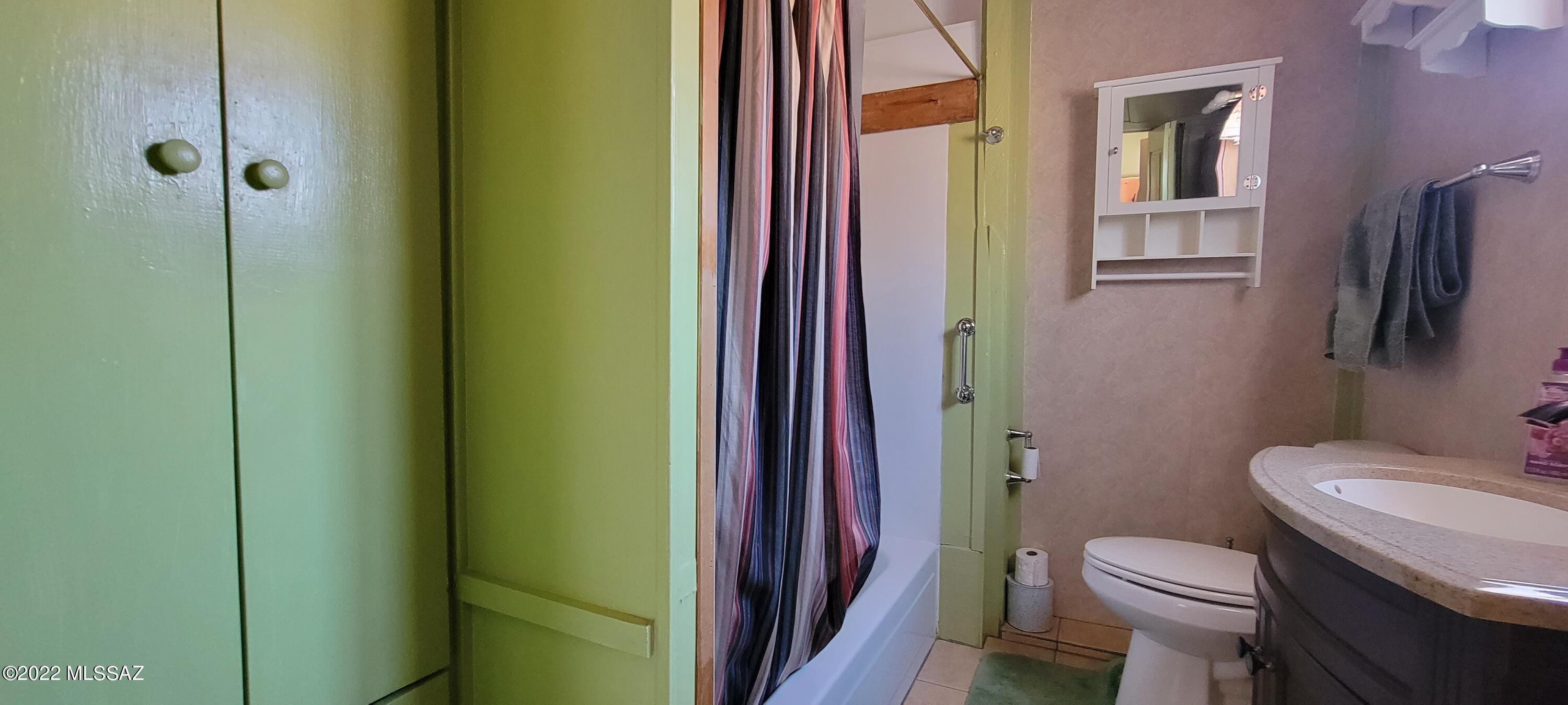 3399 Red Stag Road Pearce, AZ 85625 - Photo 19 of 47 a bathroom with a sink a toilet and shower