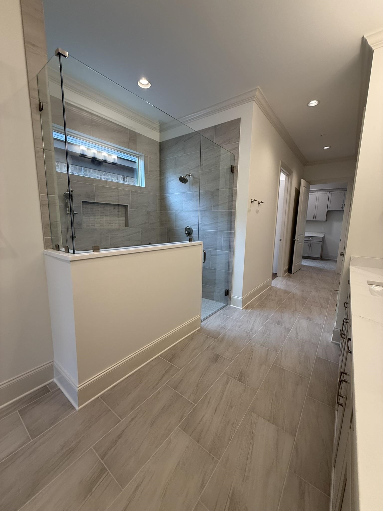 10132 Rokeby Farm Lane Collierville, TN 38017 - Photo 13 of 24 Contemporary shower enclosure featuring clear glass panels and subway tile surround