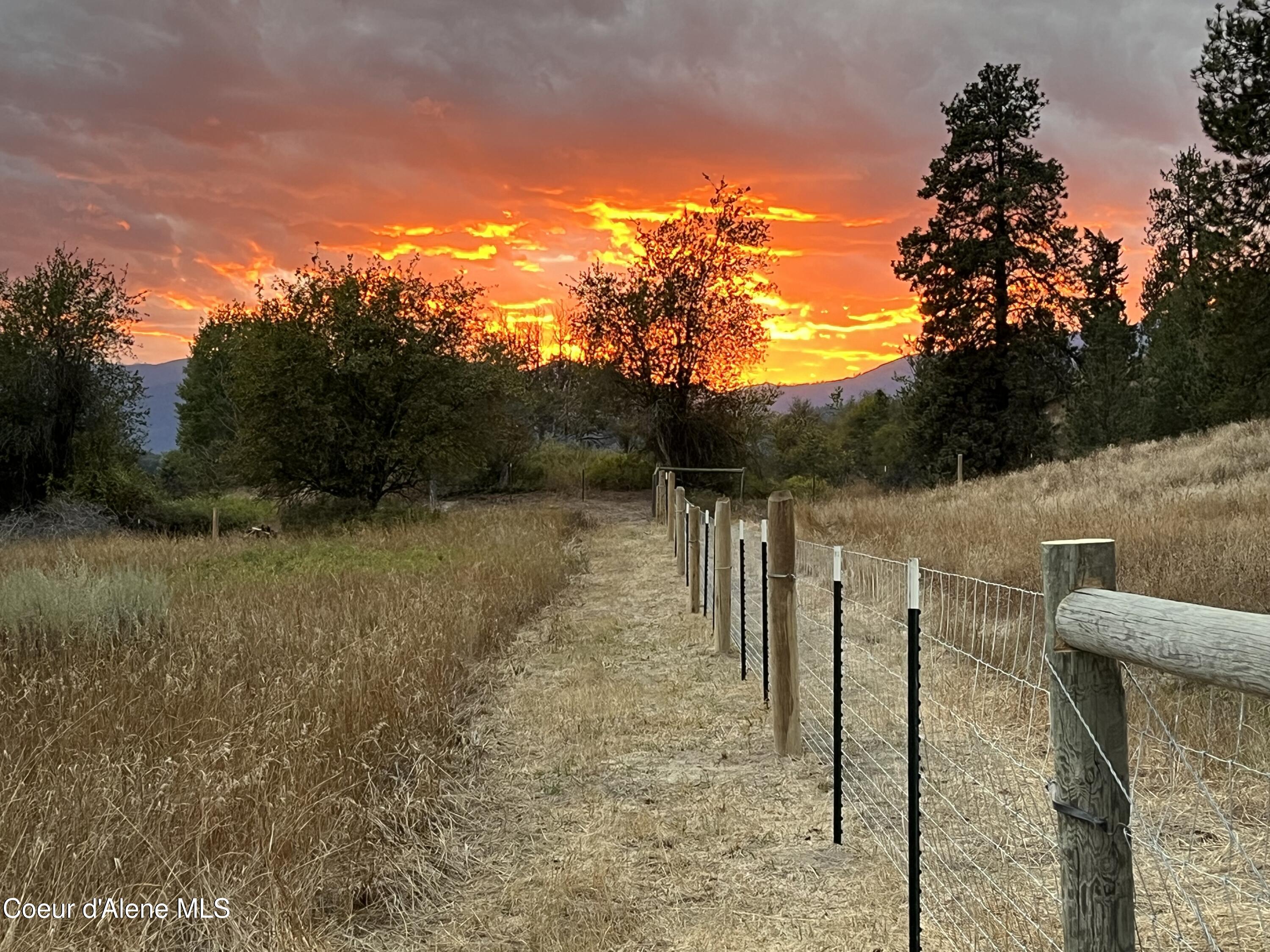 3226 District 2 Road Bonners Ferry, ID 83805 - Photo 86 of 91 Fence Sunset copy