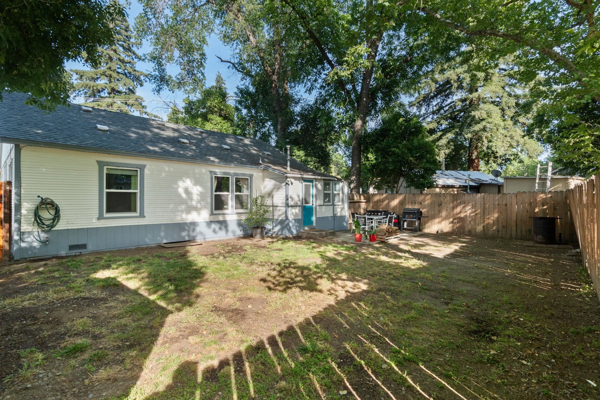 355 Jackson Street Red Bluff, CA 96080 - Photo 17 of 24 a view of a house with backyard and sitting area