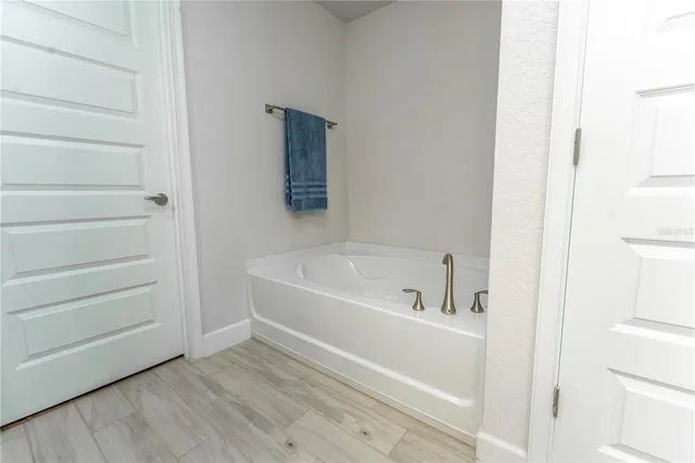 a bathroom with a bathtub