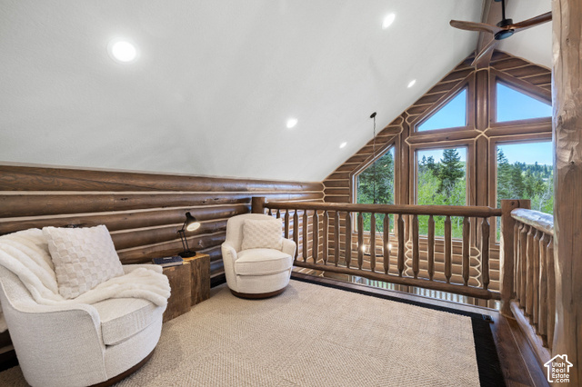 917 West Deep Forest Road Coalville, UT 84017 - Photo 18 of 41 Wood-paneled walls and ceiling, exposed log beams, large windows, recessed lighting, and a ceiling fan