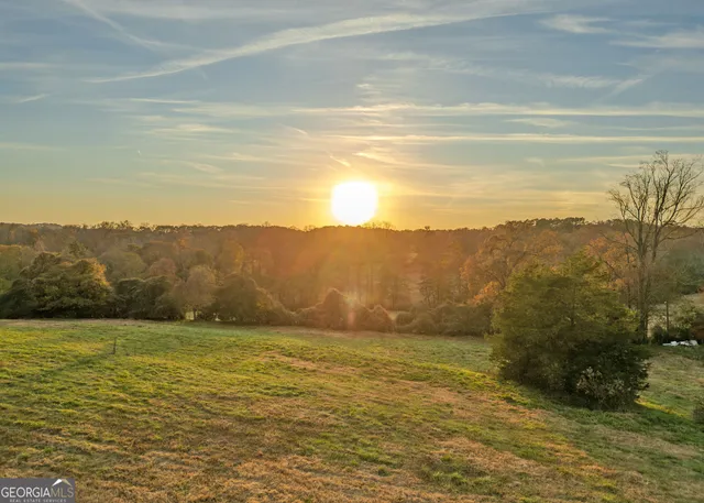 a view of an ocean and mountains