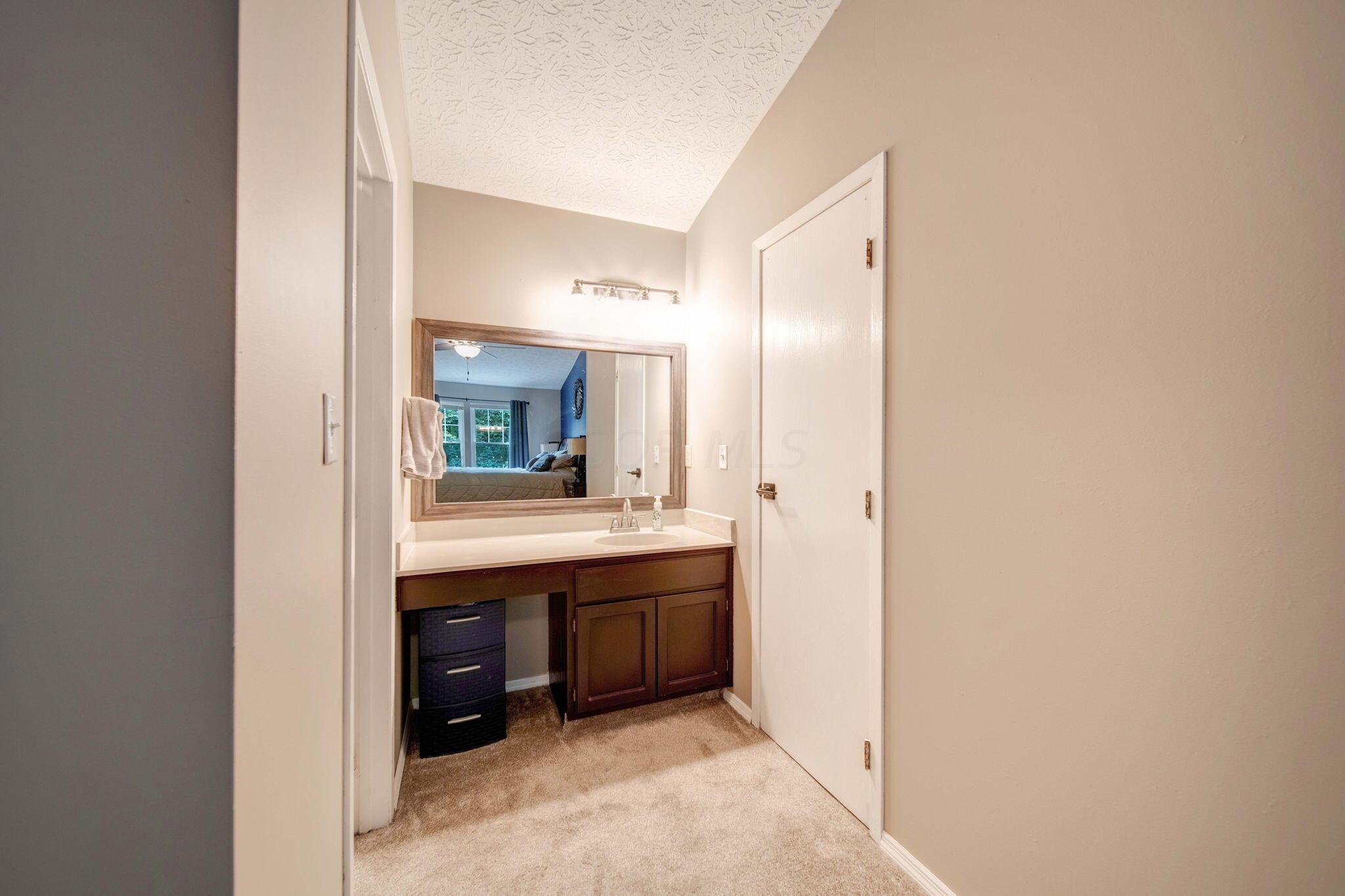 311 Ravine Ridge Drive North Powell, OH 43065 - Photo 20 of 47 Walk-in closet and full bath