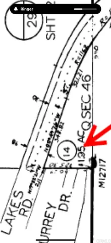 a picture of a room with a white walls and a chandelier