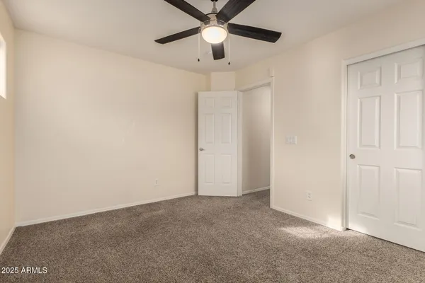 a view of an empty walk in closet