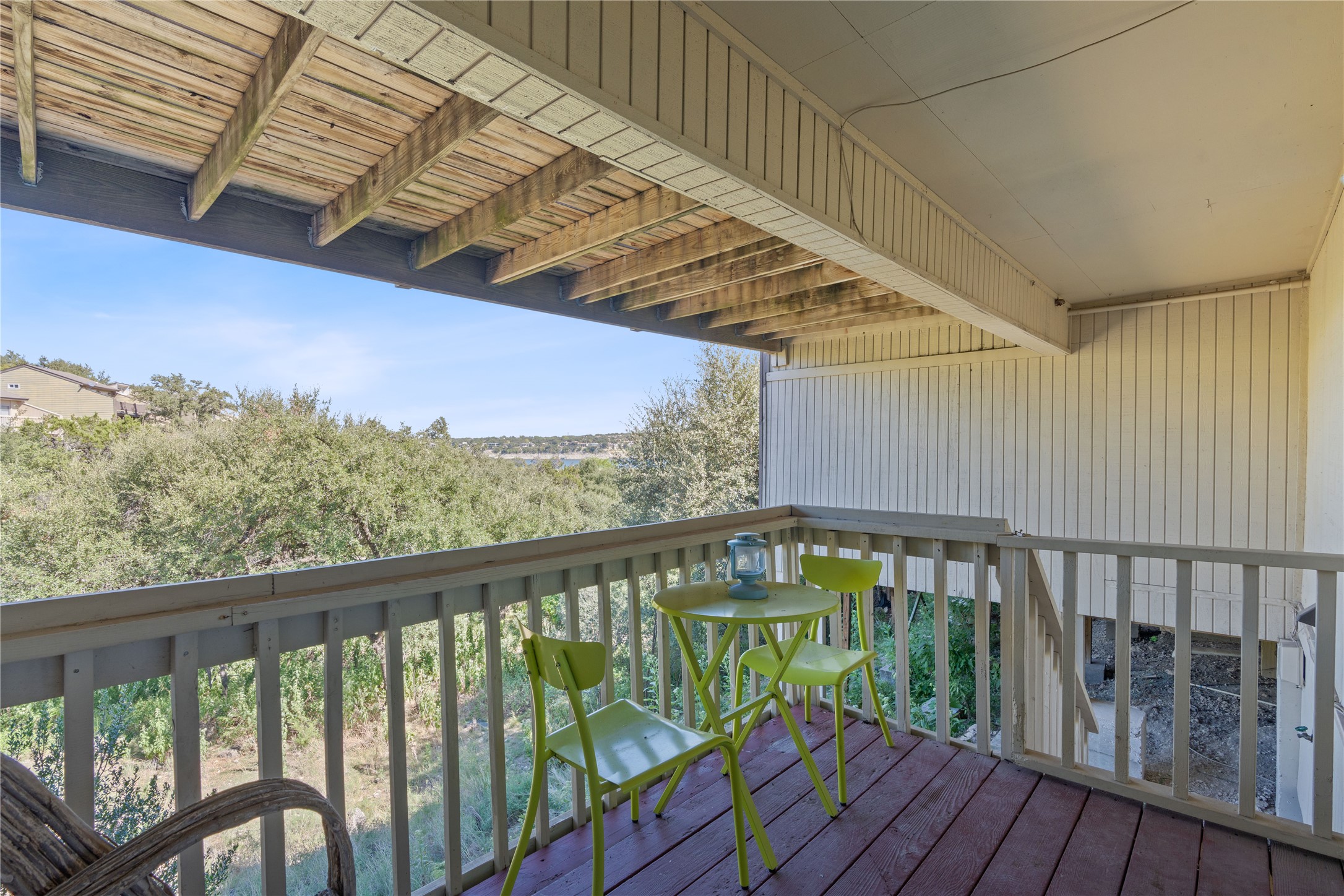 111 Comanche Drive Point Venture, TX 78645 - Photo 22 of 33 a view of a balcony with wooden floor