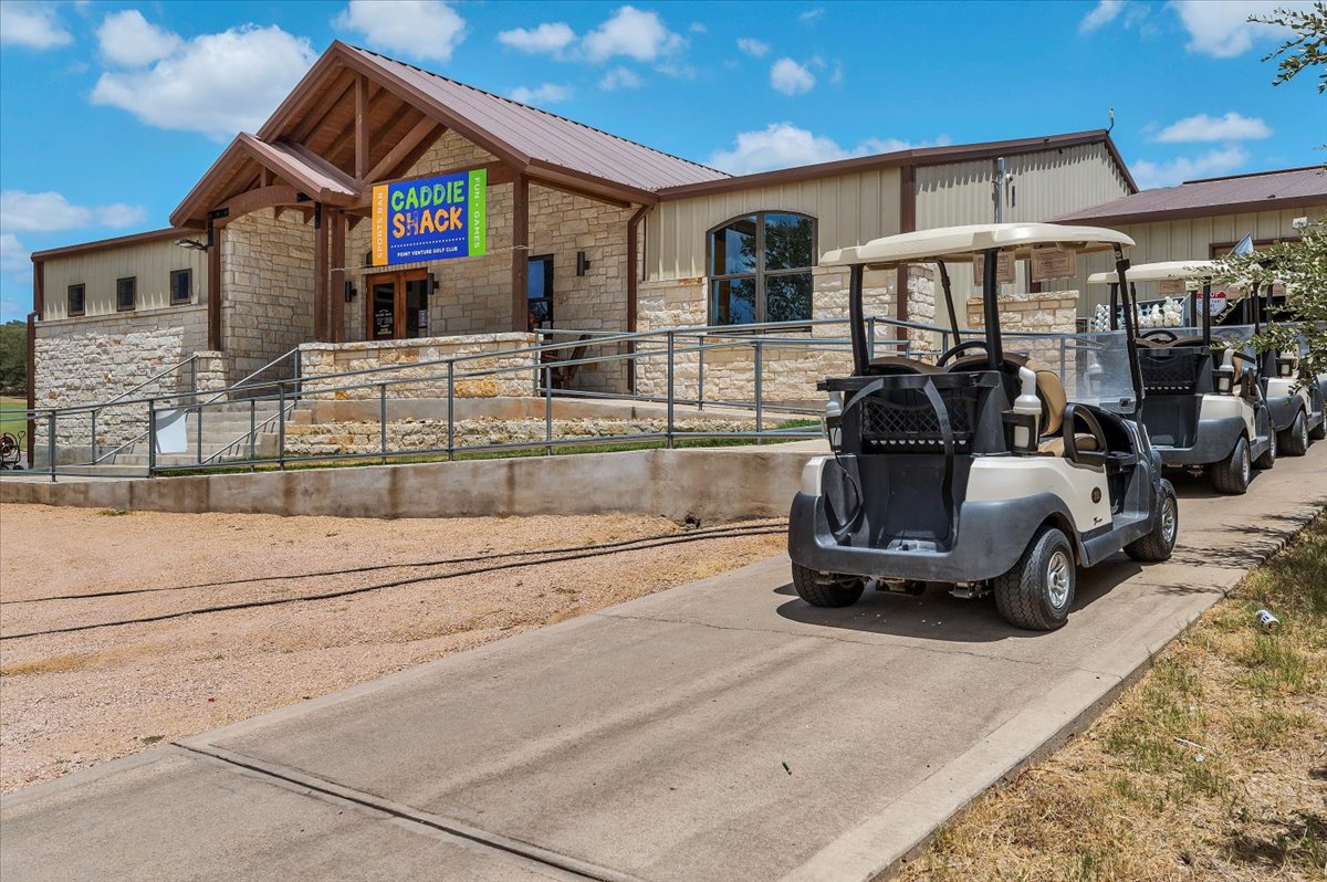 111 Comanche Drive Point Venture, TX 78645 - Photo 25 of 33 a view of a chairs and a garage
