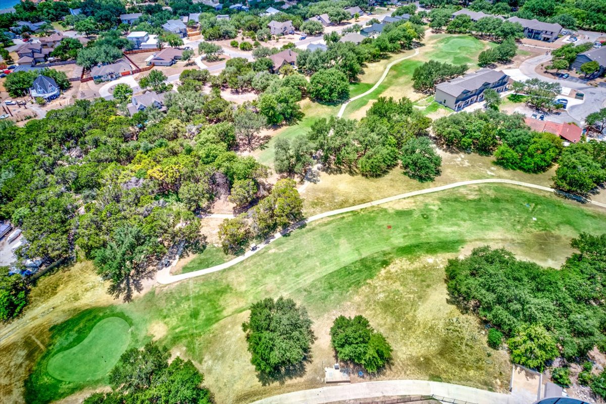 111 Comanche Drive Point Venture, TX 78645 - Photo 27 of 33 a view of yard with green space