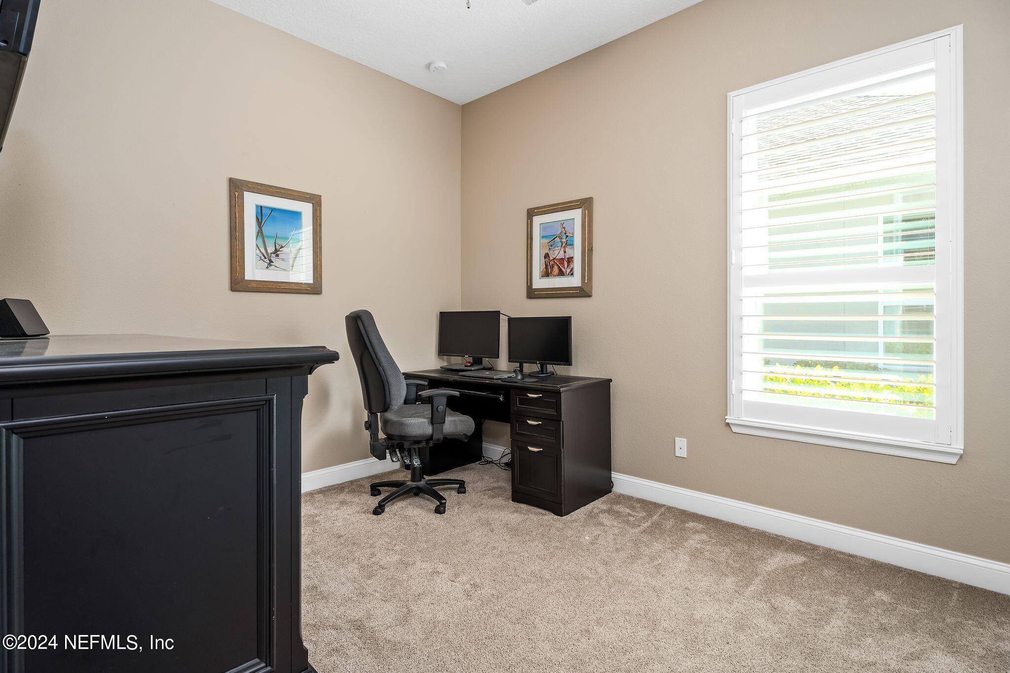 206 Medio Drive St. Augustine, FL 32095 - Photo 25 of 57 a view of a workspace with a window