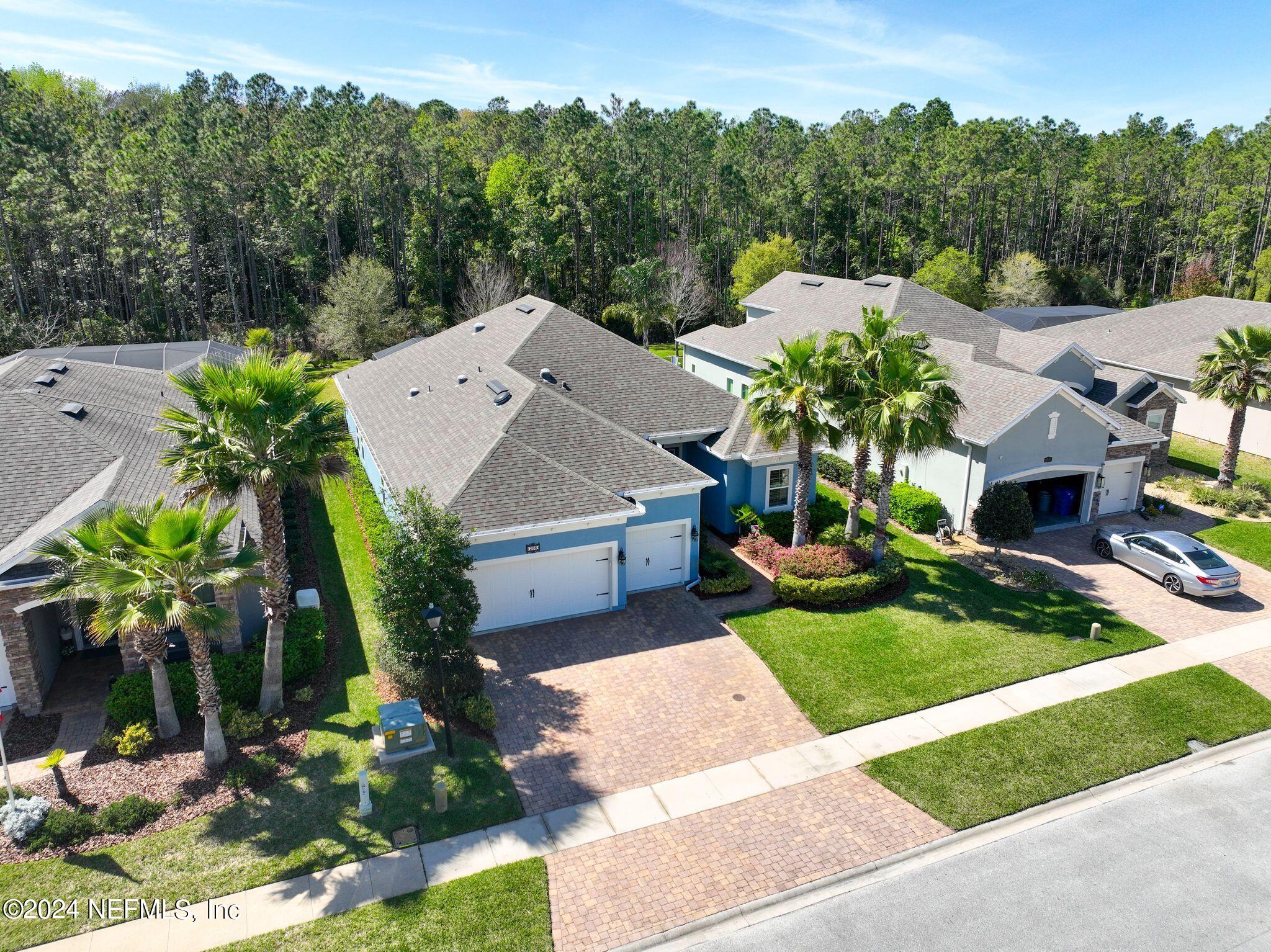 206 Medio Drive St. Augustine, FL 32095 - Photo 32 of 57 an aerial view of a house having yard