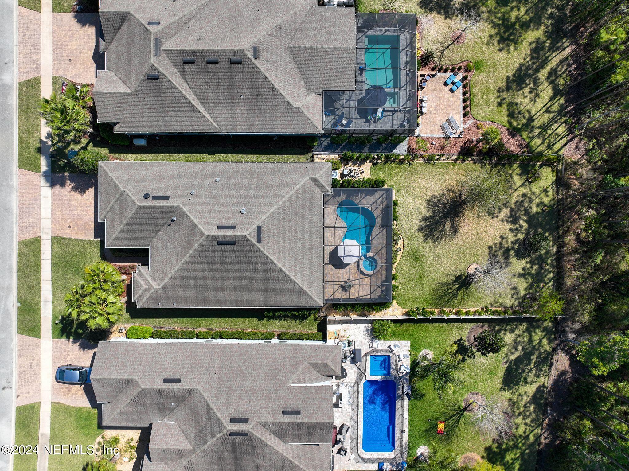 206 Medio Drive St. Augustine, FL 32095 - Photo 35 of 57 an aerial view of a house with a yard