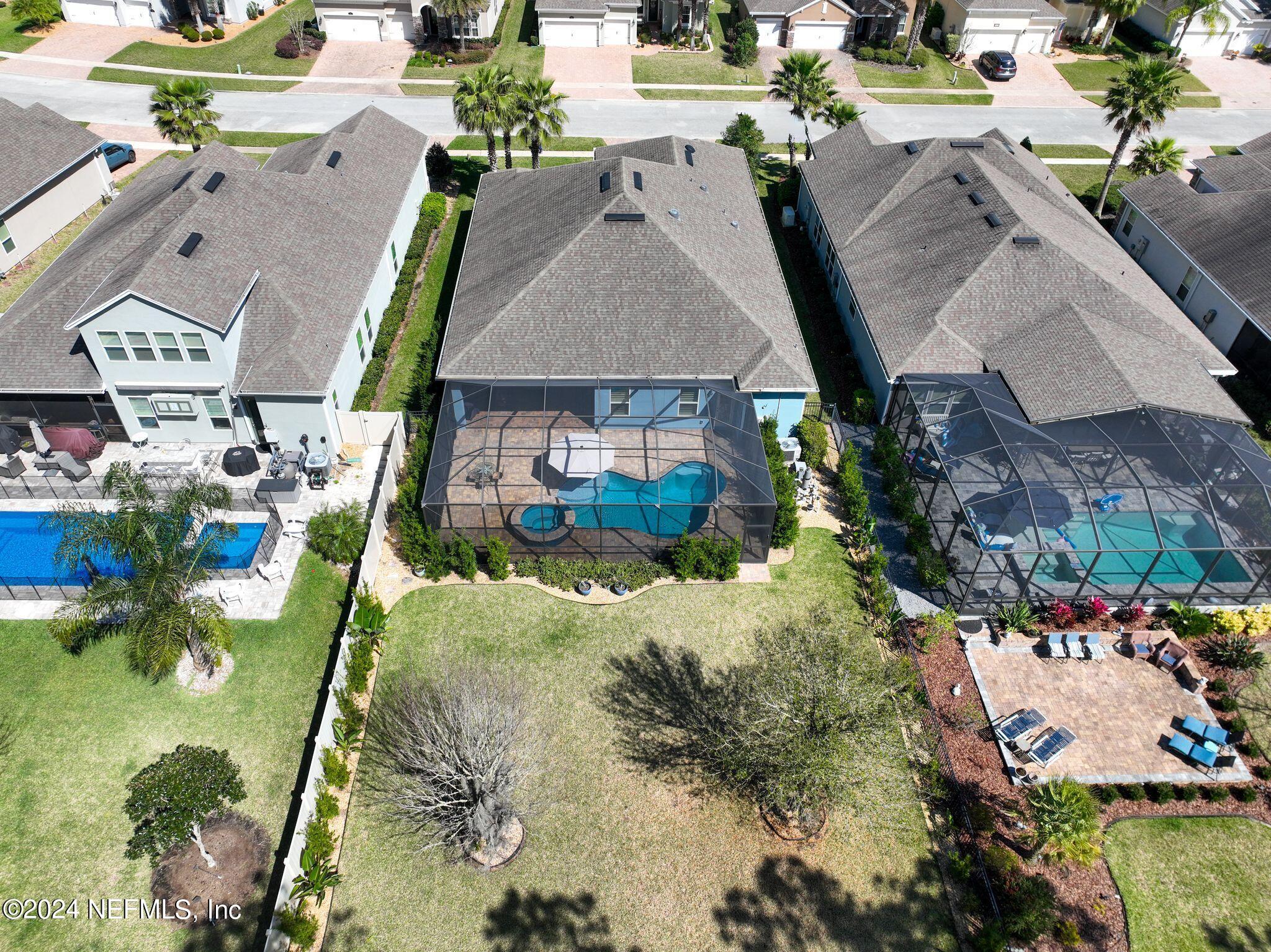 206 Medio Drive St. Augustine, FL 32095 - Photo 36 of 57 an aerial view of a house with a yard basket ball court and outdoor seating