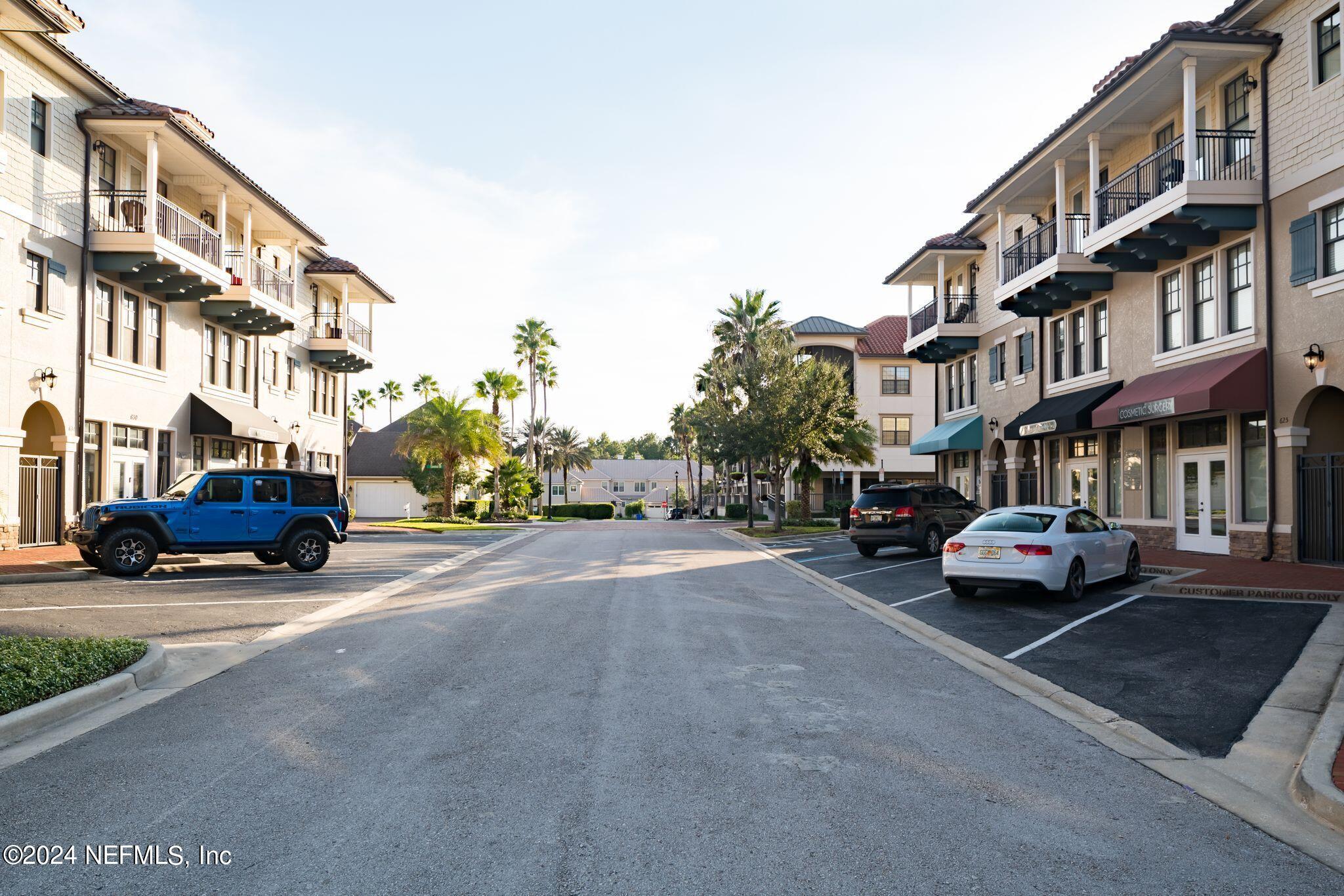 206 Medio Drive St. Augustine, FL 32095 - Photo 40 of 57 a cars parked on the side of a street