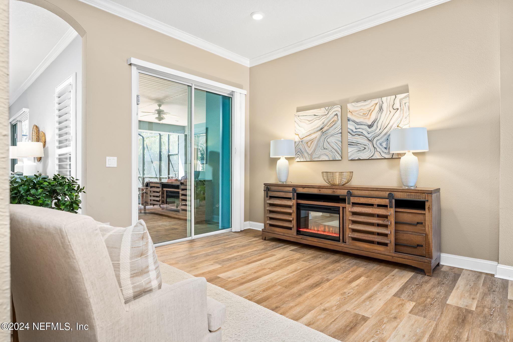 206 Medio Drive St. Augustine, FL 32095 - Photo 5 of 57 a bedroom with a bed and a dresser