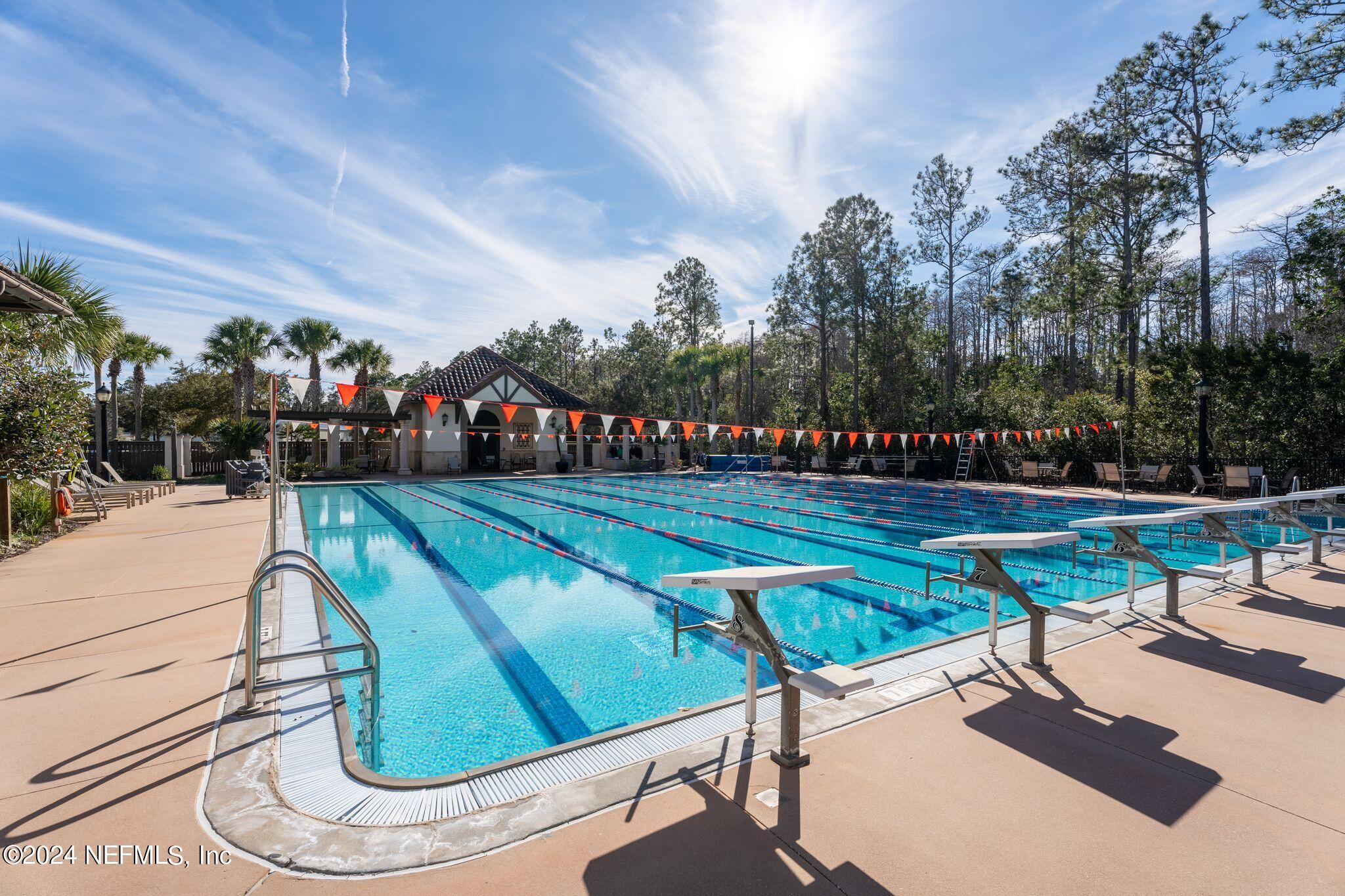 206 Medio Drive St. Augustine, FL 32095 - Photo 53 of 57 a view of a swimming pool with a patio