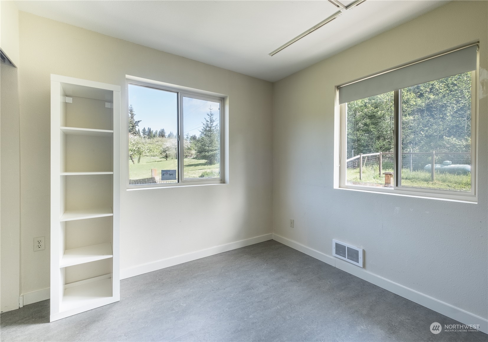 1750 Lancaster Road Freeland, WA 98249 - Photo 14 of 33 a view of an empty room with a window
