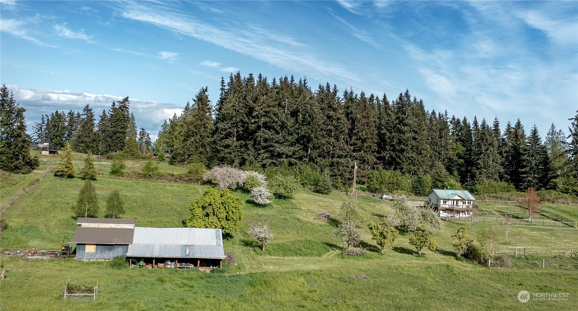 1750 Lancaster Road Freeland, WA 98249 - Photo 26 of 33 a view of a house with a yard