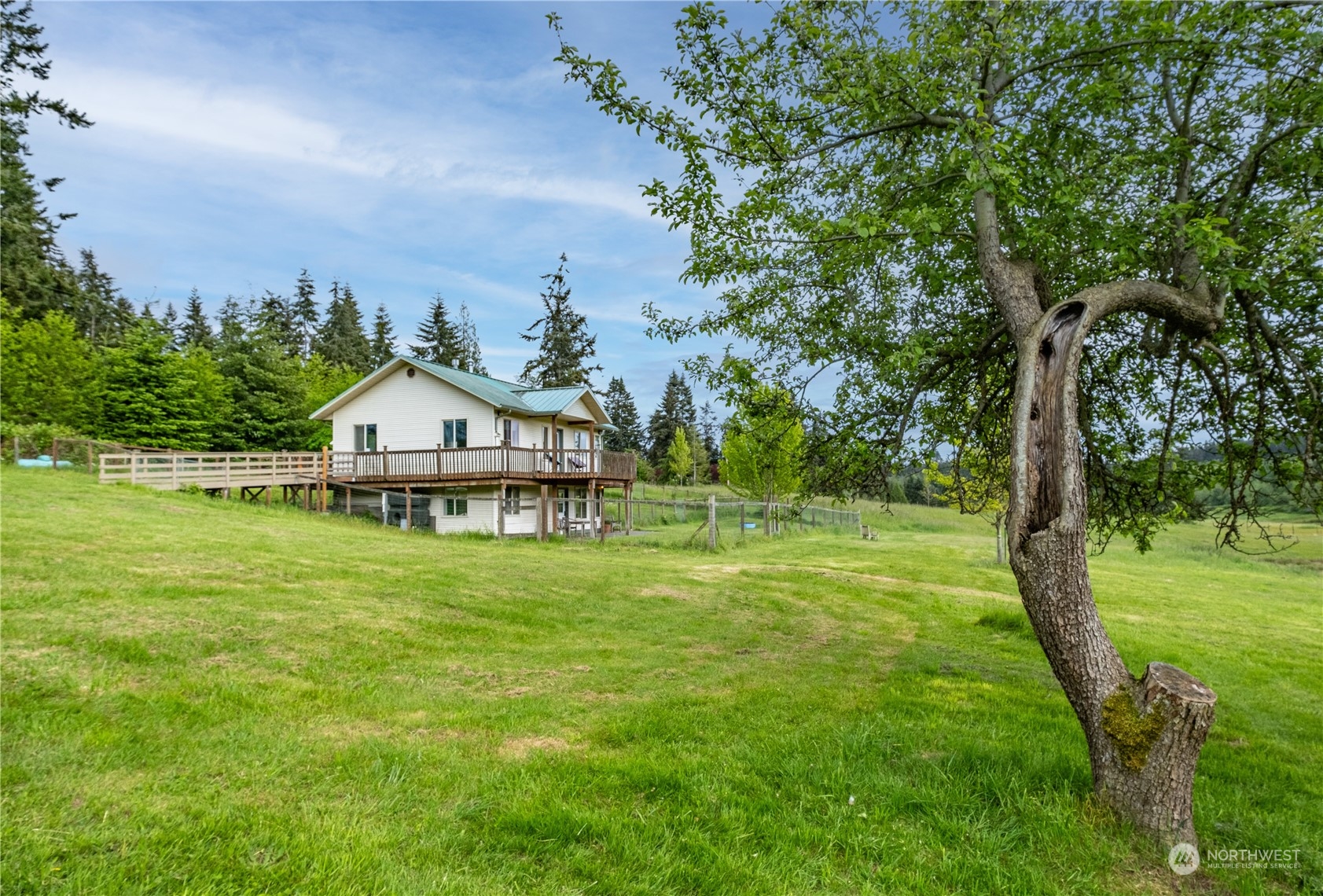 1750 Lancaster Road Freeland, WA 98249 - Photo 3 of 33 a view of a tiny house with a yard