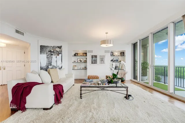 a view of a swimming pool with a chair and tables