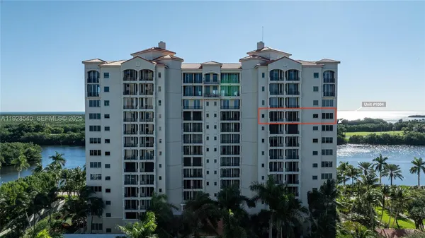 a view of a balcony with chairs