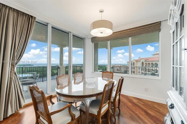 a view of a dining room and furniture window and outside view