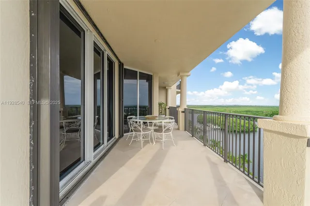 a view of a lake in middle of the house