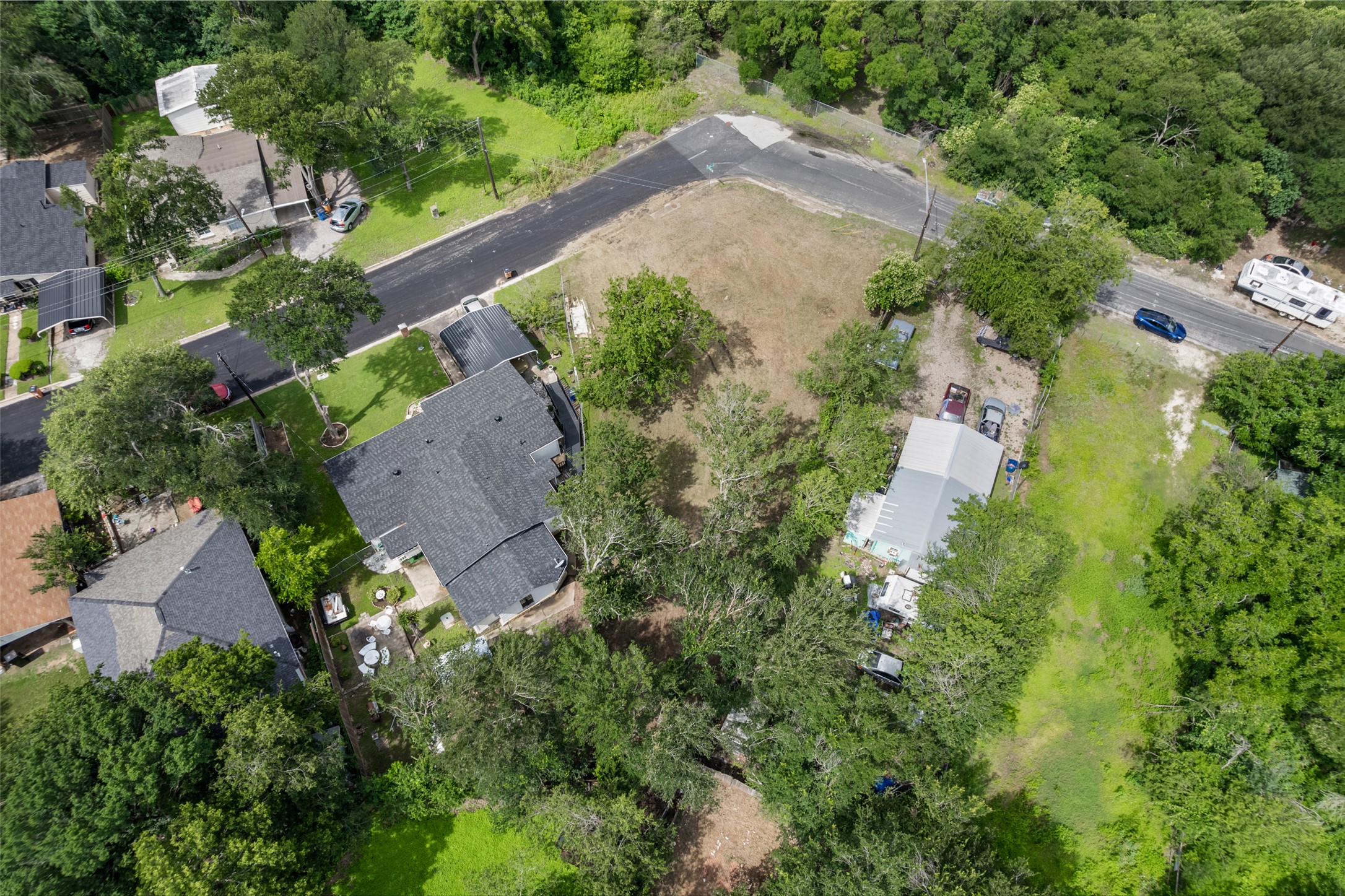 1201 Fort Branch Boulevard Austin, TX 78721 - Photo 14 of 19 An aerial perspective reveals a prime development opportunity with cleared land bordering existing residences.
