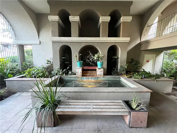 a view of an entryway with a floor to ceiling window