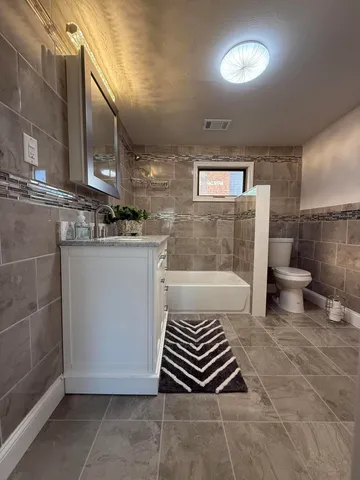 a bathroom with a sink and a shower