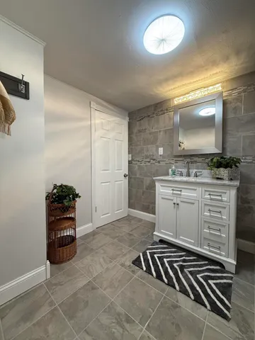 a kitchen with stainless steel appliances a stove and a refrigerator