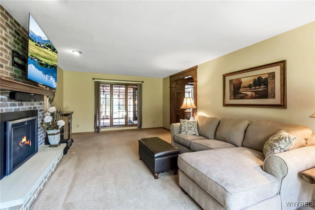 29 Brunck Road Lancaster, NY 14086 - Photo 7 of 49 Gas fireplace with remote