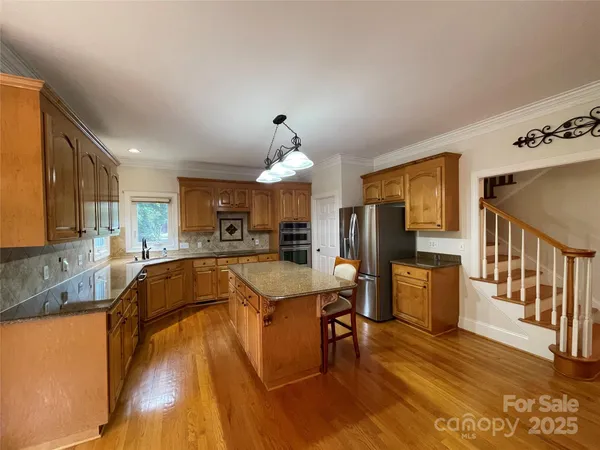 a view of livingroom with furniture and wooden floor