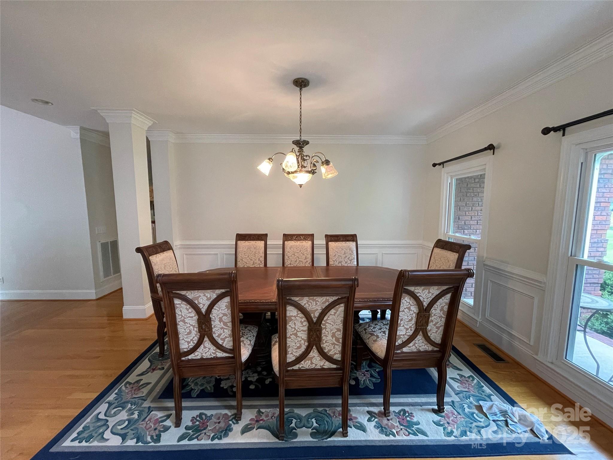 103 Berea Baptist Church Road Stanfield, NC 28163 - Photo 21 of 46 a view of a dining room with furniture and wooden floor