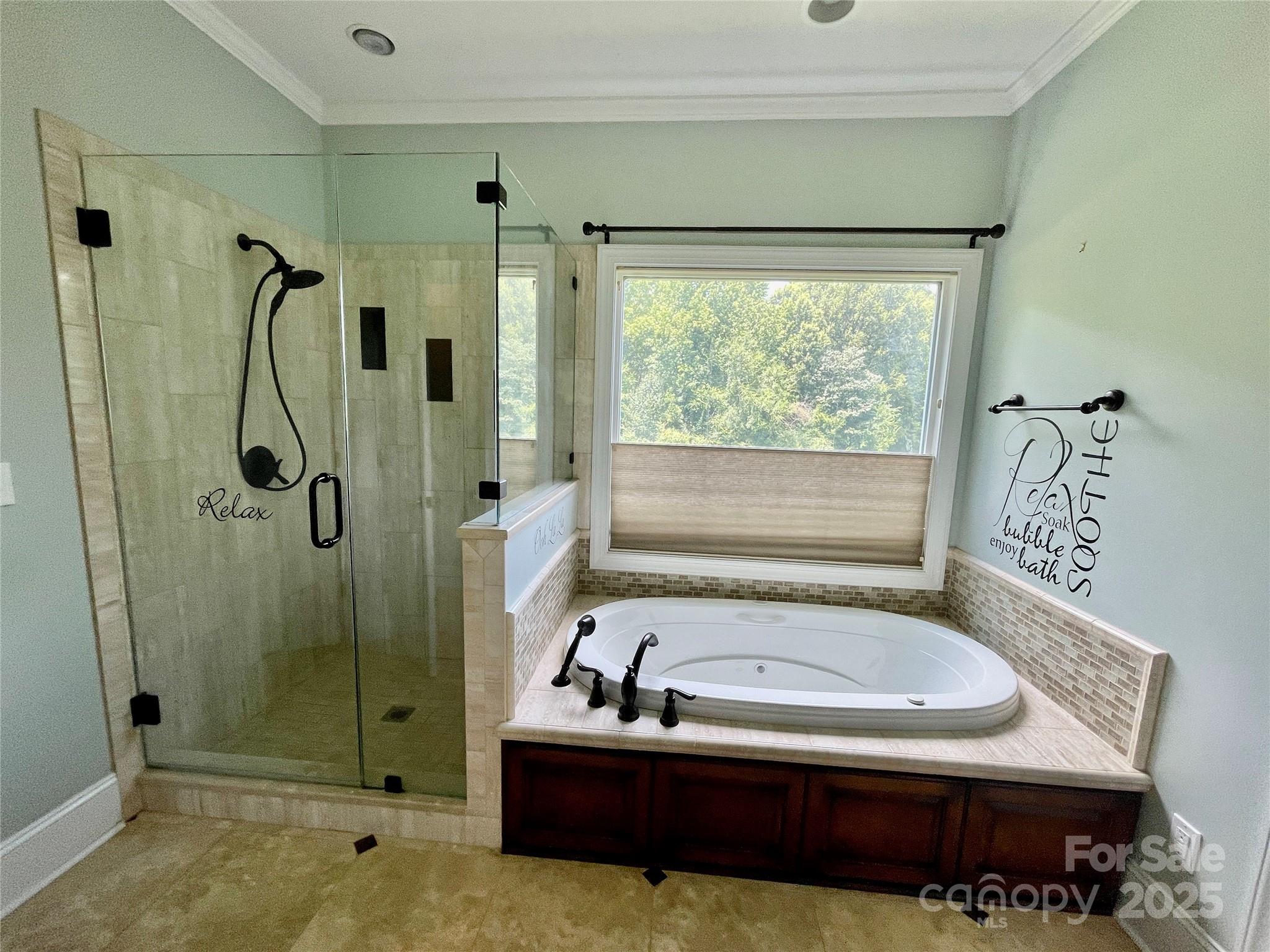 103 Berea Baptist Church Road Stanfield, NC 28163 - Photo 28 of 46 a bathroom with a tub and a shower