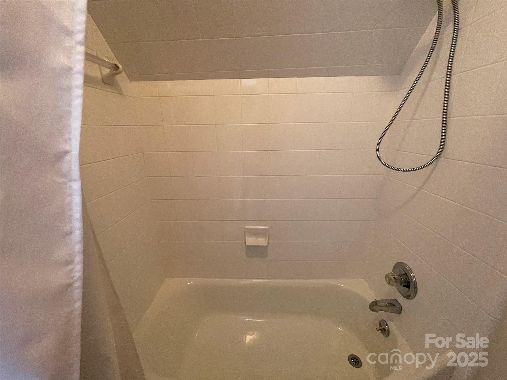 103 Berea Baptist Church Road Stanfield, NC 28163 - Photo 34 of 46 a bathroom with a bathtub