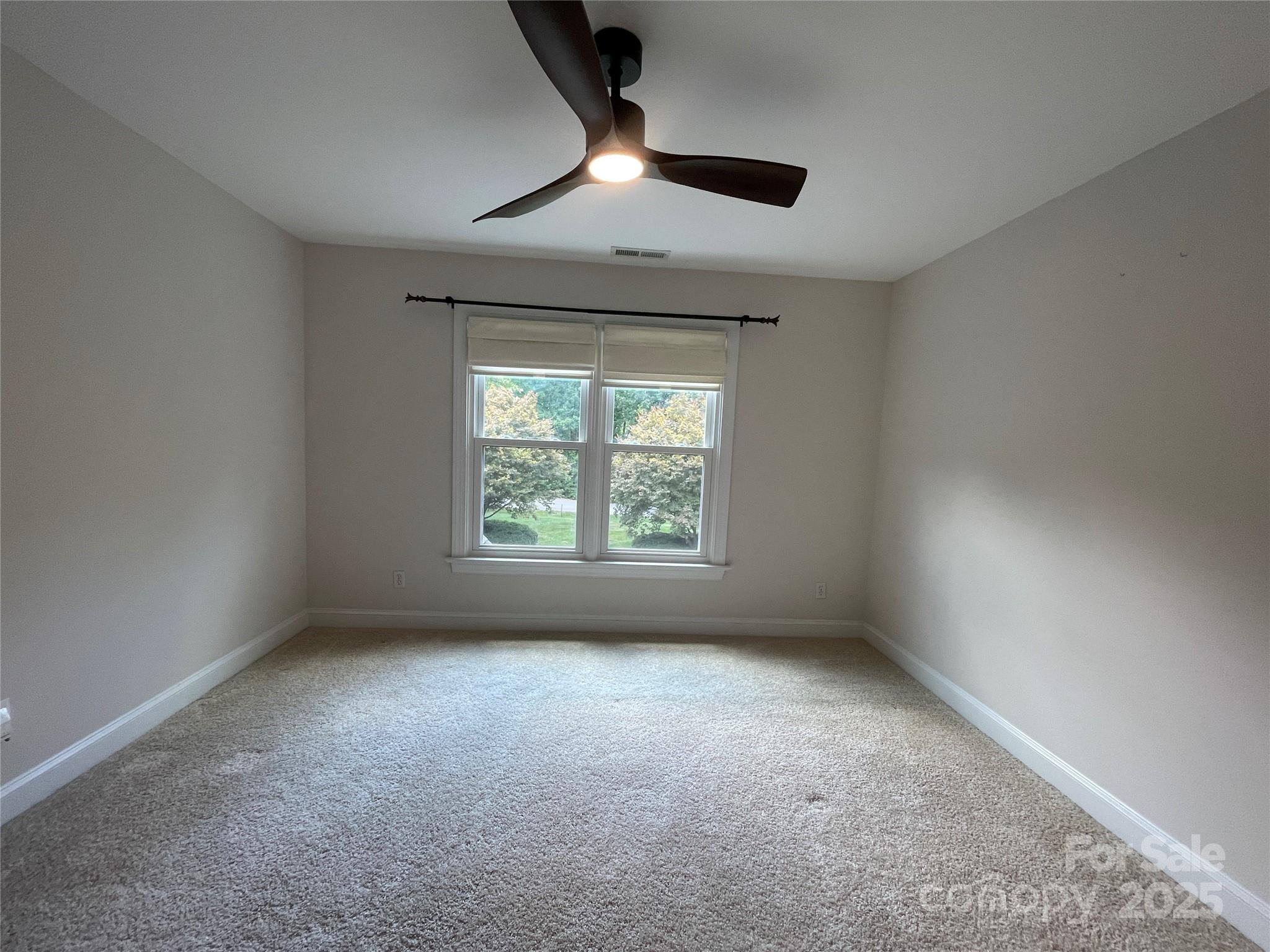 103 Berea Baptist Church Road Stanfield, NC 28163 - Photo 35 of 46 an empty room with a window