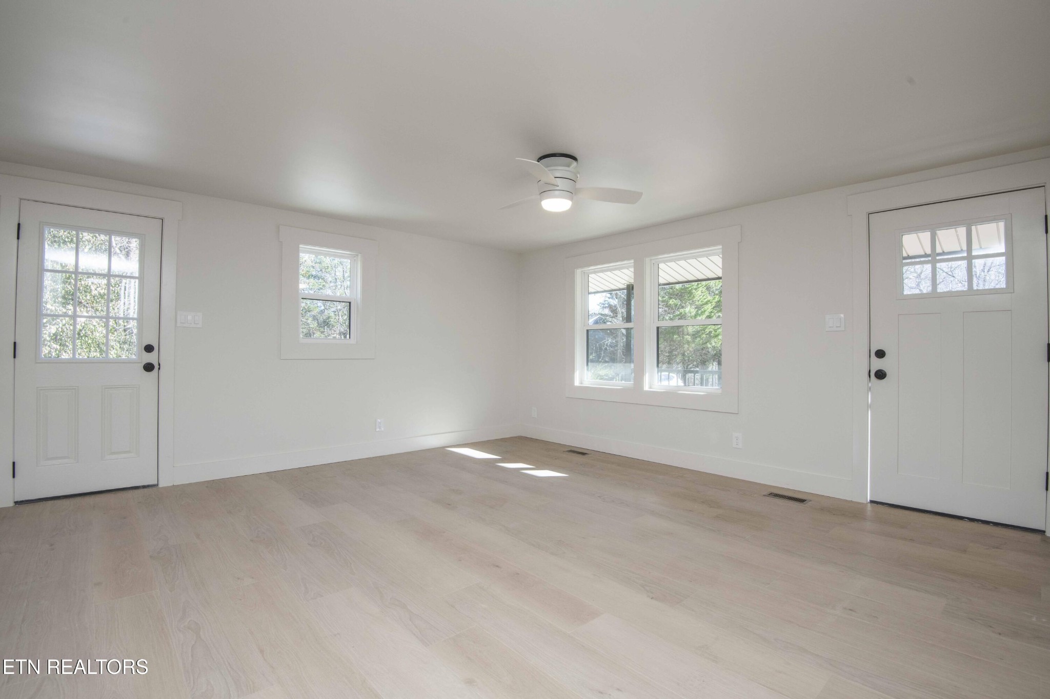 6223 Babelay Road Knoxville, TN 37924 - Photo 17 of 53 an empty room with windows