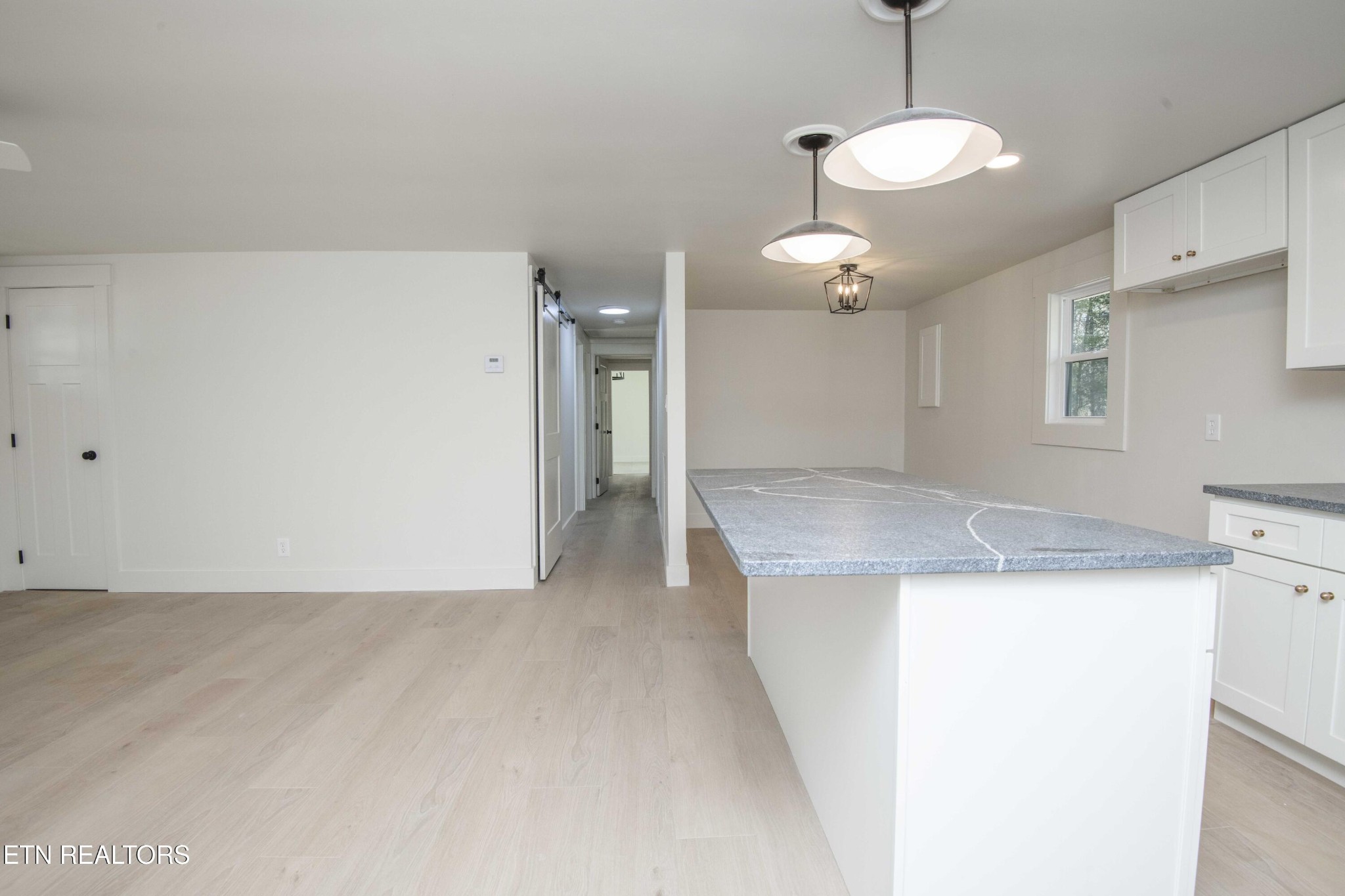 6223 Babelay Road Knoxville, TN 37924 - Photo 20 of 53 a view of a kitchen with a sink and a refrigerator