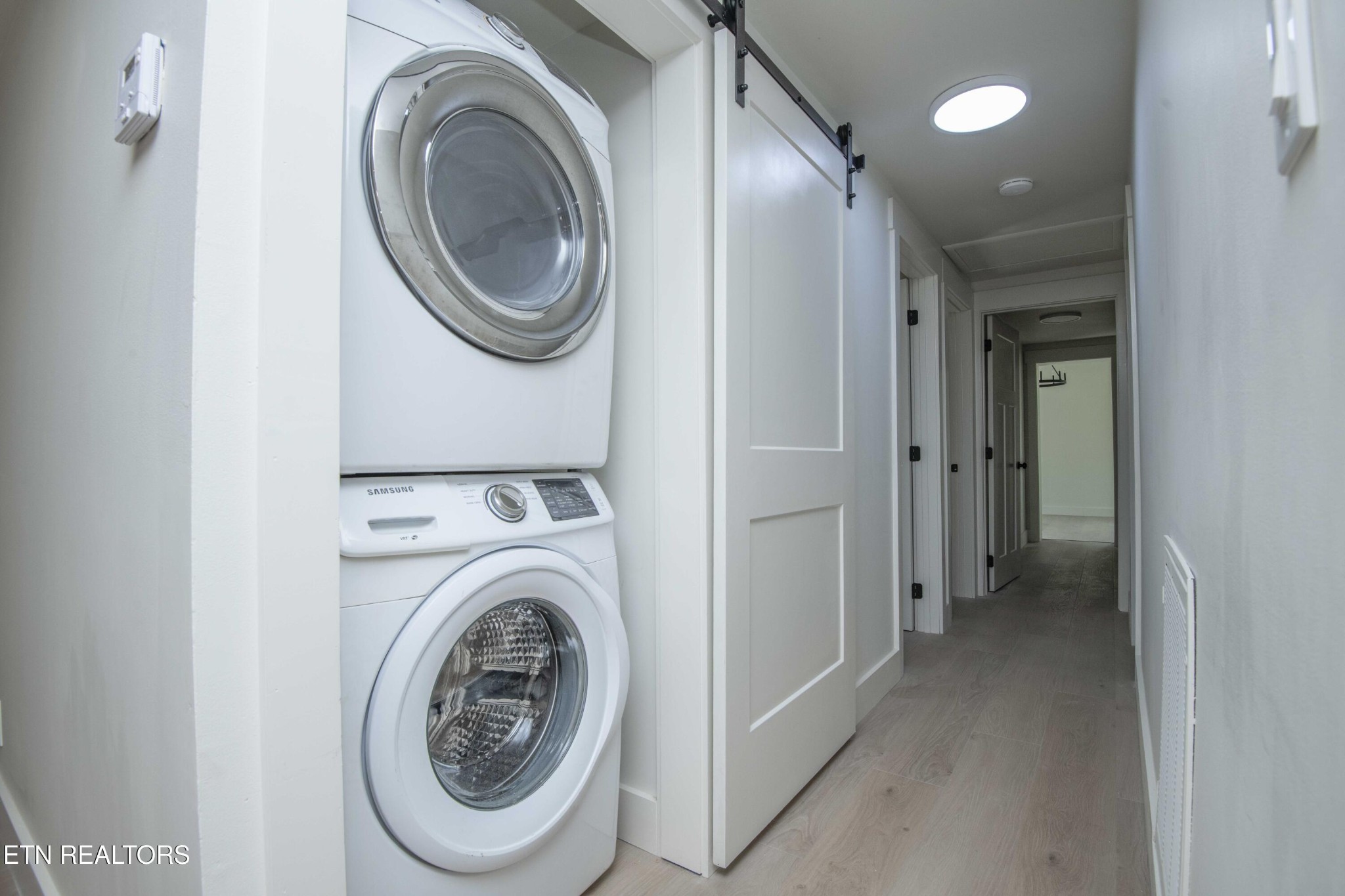 6223 Babelay Road Knoxville, TN 37924 - Photo 28 of 53 a view of a hallway with washer and dryer