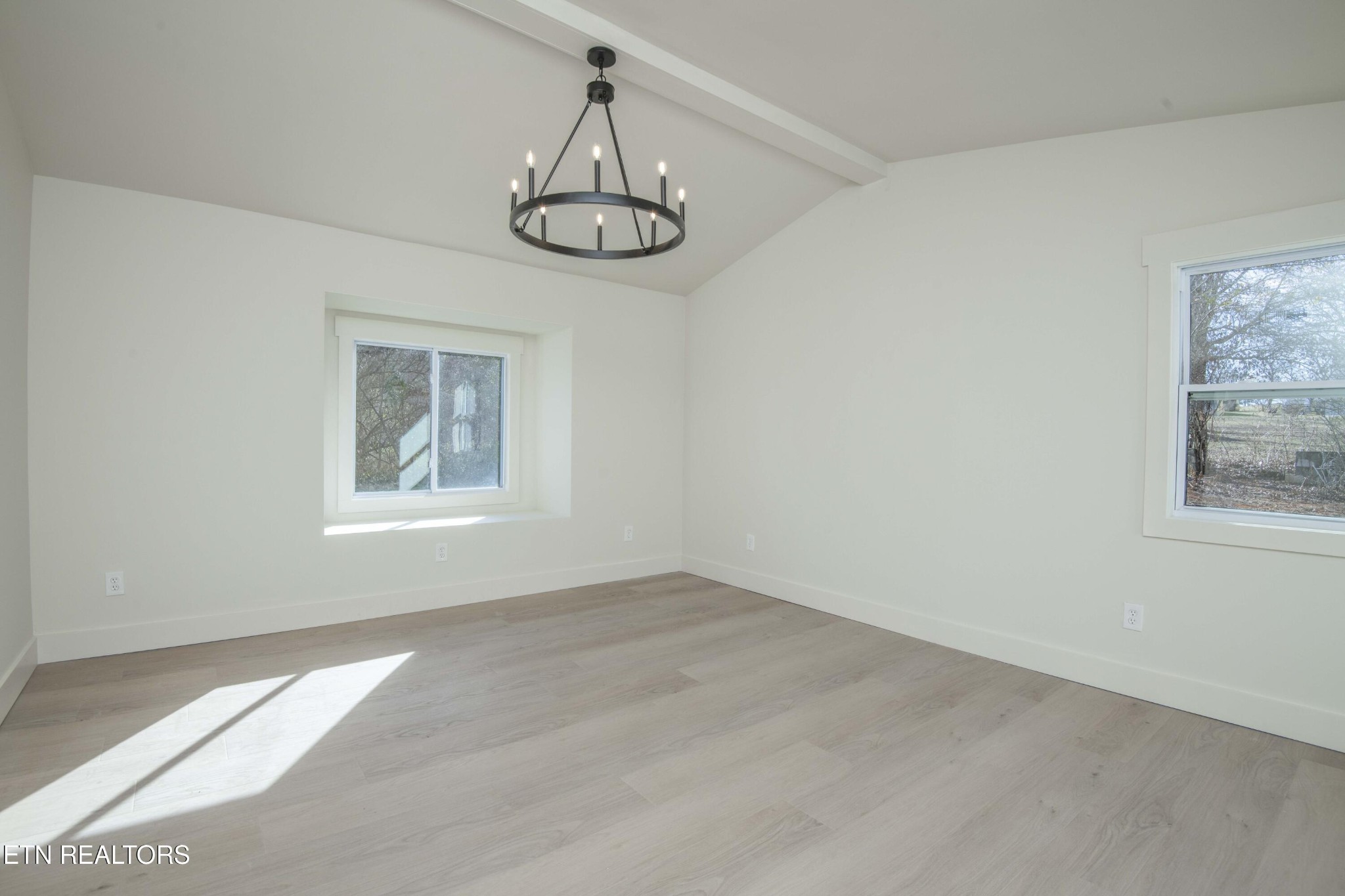6223 Babelay Road Knoxville, TN 37924 - Photo 30 of 53 a view of empty room with window and chandelier